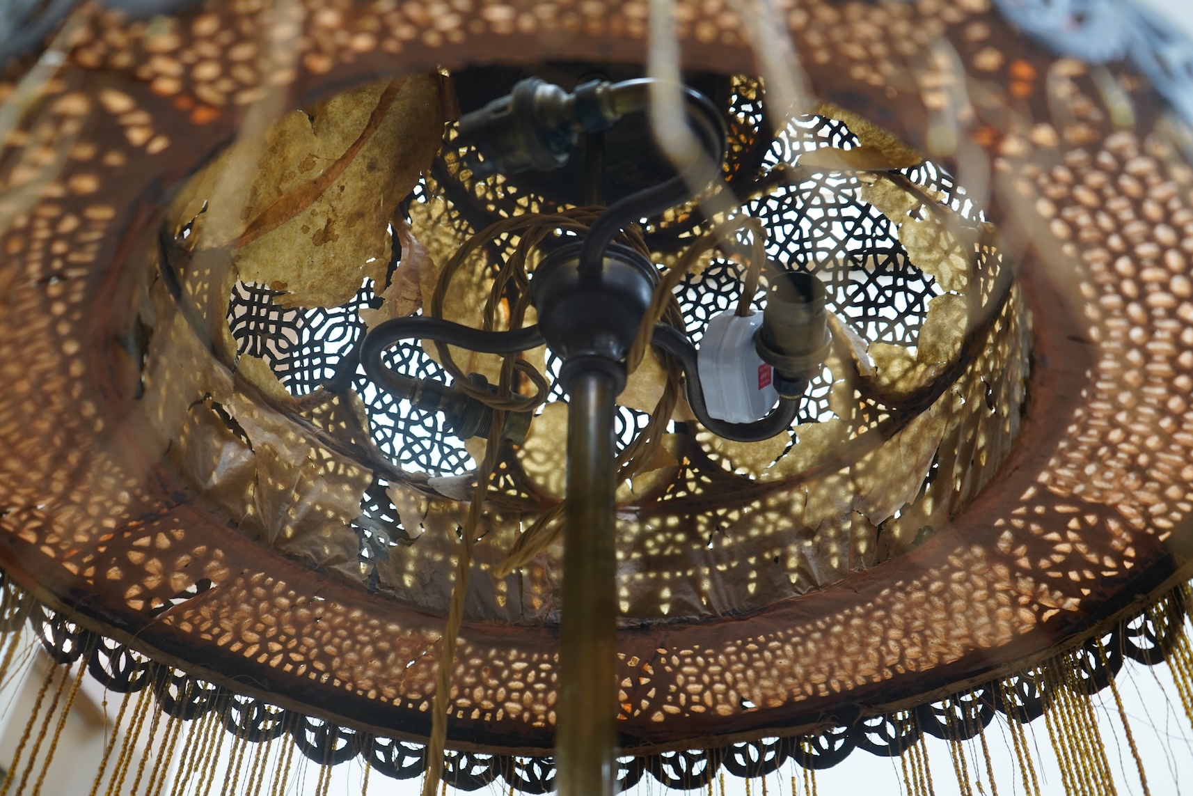 A large Moroccan pierced brass lamp and shade, 20th century